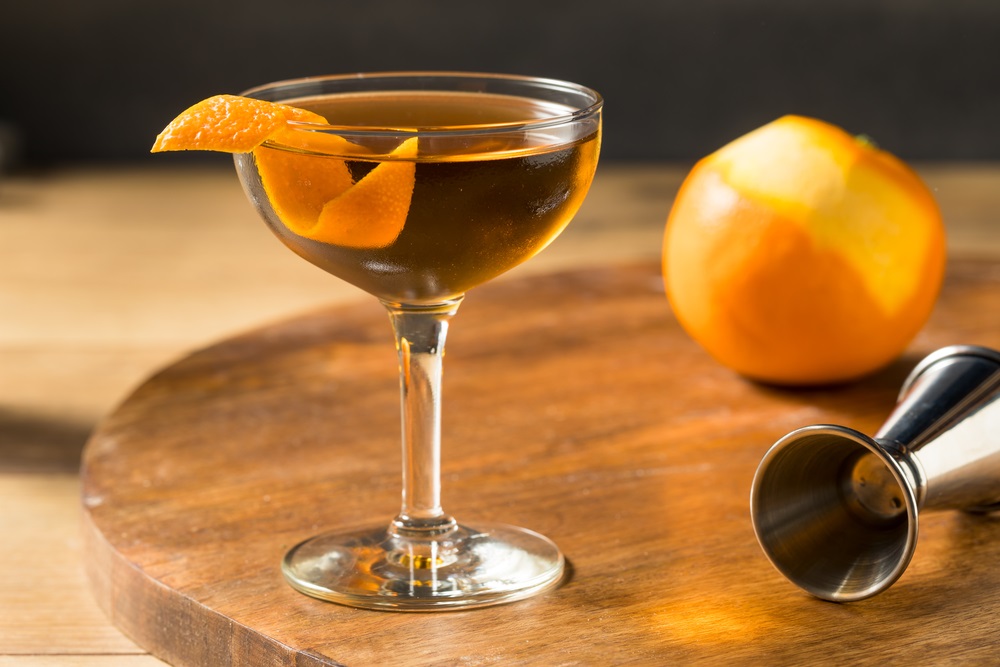 Classic Hanky Panky Cocktail with Cognac and an Orange Garnish